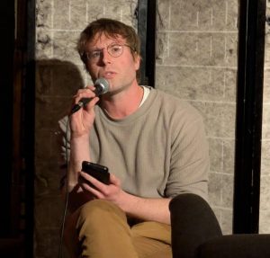 John Knetemann reading poetry in Amsterdam